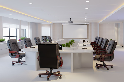Interior Business Scene , Wooden Conference Table With Black Office Chairs, Projection Screen. Office Is Modern, With White Walls, Green Plants, And White Floor