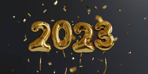 Happy New Year 2023. New Year balloons. Shiny confetti falling down over golden balloons. 3D render. stock photo