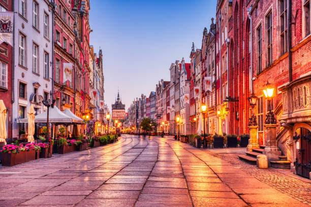 Illuminated Streed in Gransk Old Town at Dusk, Poland Illuminated Streed in Gransk Old Town at Dusk, Poland, Europe gdansk city stock pictures, royalty-free photos & images