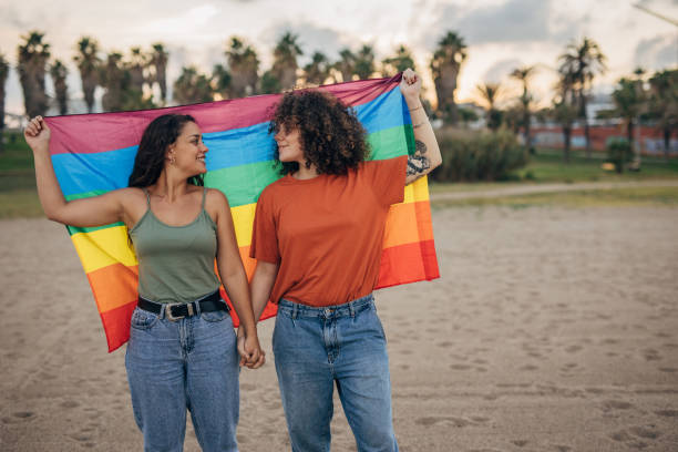 istock Lesbian couple on the beach 1445278203