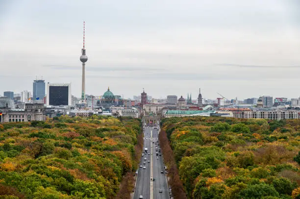 View on Brandenburg gate and Tiergarten from victory column in Berlin on a cloudy day in autumn