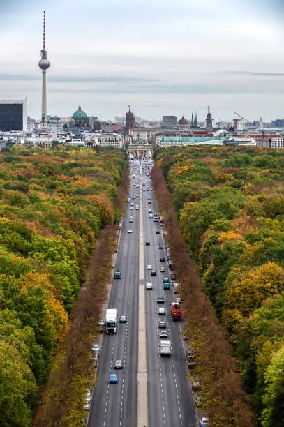 View on Brandenburg gate and Tiergarten from victory column in Berlin on a cloudy day in autum