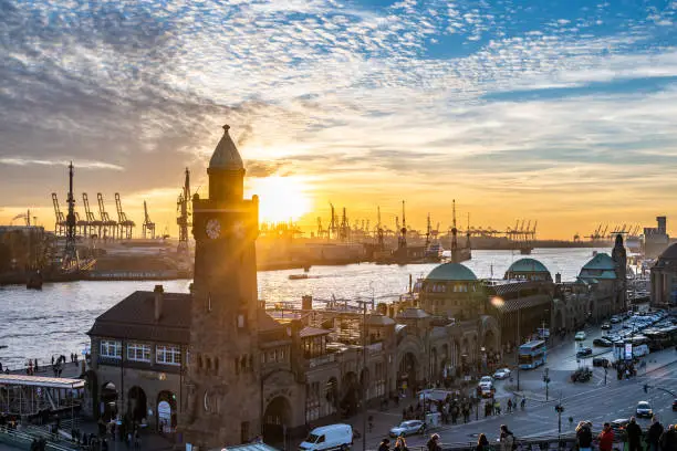 The Landungsbruecken with the port of Hamburg during sunset