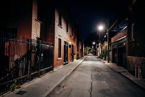 Dark alley in Le Plateau district. Montreal, Canada