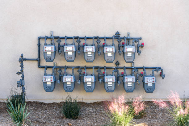 Gas meters on an external wall of an apartment building stock photo