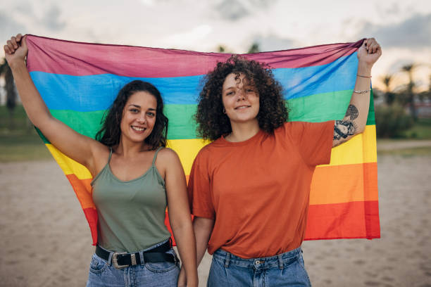 istock Lesbian couple on the beach 1445280737