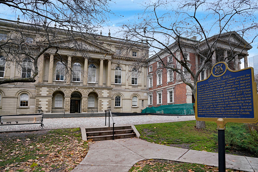 Toronto, Canada - November 28 2022:  Osgoode Hall court house, one of the oldest buildings in Toronto, with a plaque describing its history