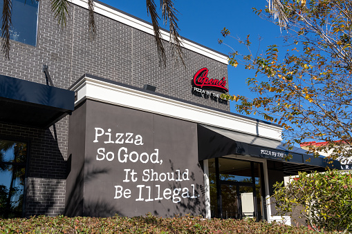 Kissimmee, FL, USA - January 30, 2022: Capone's Coal Fired Pizza restaurant at Margaritaville Resort Orlando in Kissimmee, FL, USA. Capone's is a restaurant serving Italian specialties.