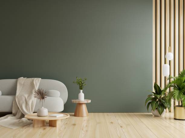 istock Gray sofa with table on green wall and wooden flooring. 1445285725