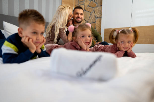 istock Happy children and their parents 1445288731
