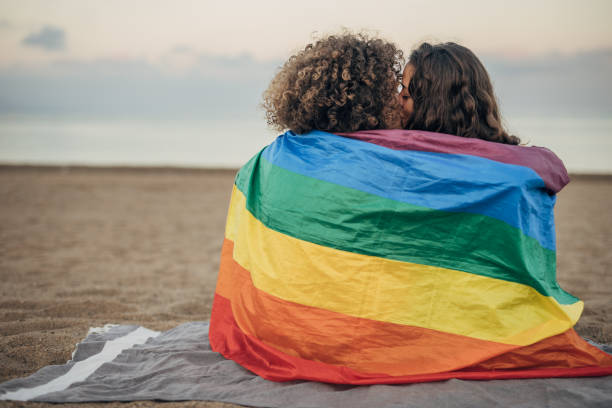 istock Lesbian couple on the beach 1445289013