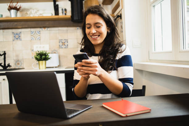 istock Young female freelancer working at her home office 1445294450