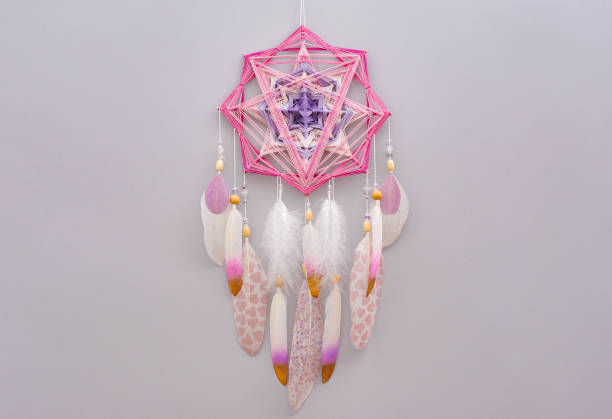 istock Esoteric woven mandala magical dreamcatcher  on grey background 1445295849