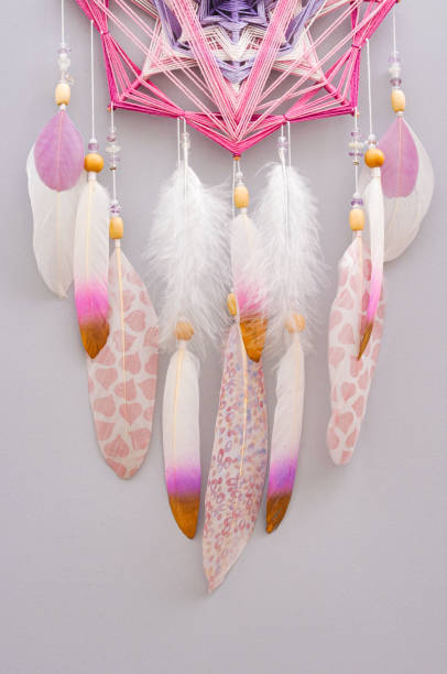 istock Esoteric woven mandala magical dreamcatcher  on grey background 1445295852
