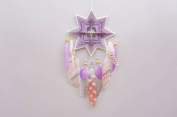 istock Esoteric woven mandala magical dreamcatcher  on grey background 1445295859