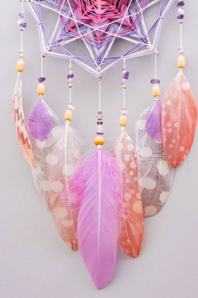 istock Esoteric woven mandala magical dreamcatcher  on grey background 1445296376