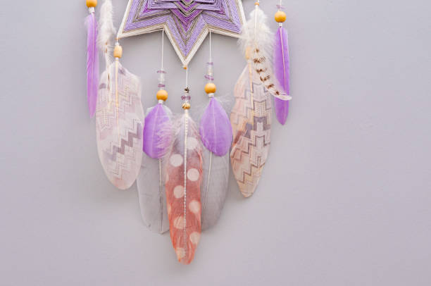 istock Esoteric woven mandala magical dreamcatcher  on grey background 1445296927