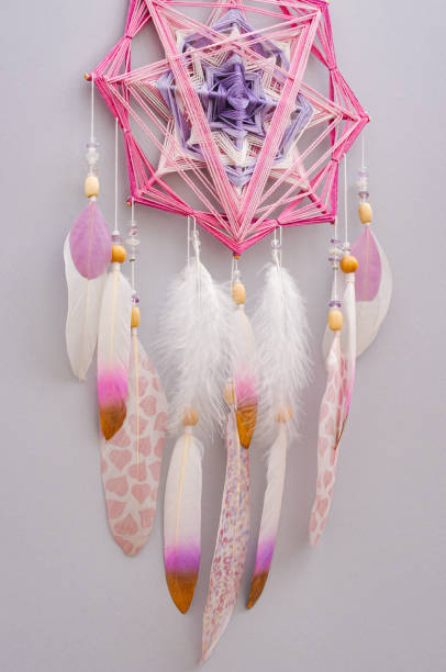 istock Esoteric woven mandala magical dreamcatcher  on grey background 1445296930