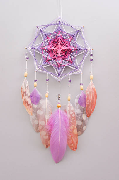 istock Esoteric woven mandala magical dreamcatcher  on grey background 1445297079