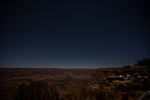 Big Dipper Hangs In The Sky Over The Grand Canyon on calm winter night