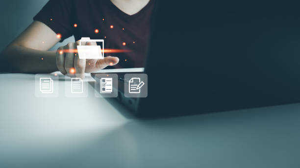 istock Businesswoman use finger touch screen folder manage file,online data management,Document Management System DMS,access to document file with security,structure design document,ERP enterprise 1445305287