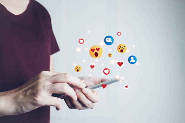istock Concept of using digital media, technology, social media online surfing, woman's hand using smartphone to use the internet, work from home for social distancing. 1445305335