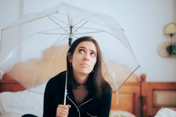 istock Unhappy Homeowner Having Trouble with Water Leakage 1445310970