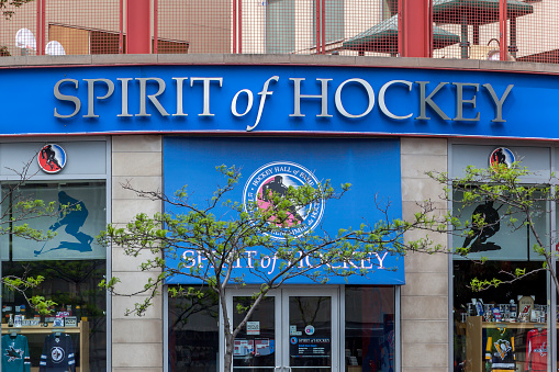 Toronto, Canada - May 26, 2018: Spirit of Hockey at  entrance of the Hockey Hall of Fame in Toronto, a museum and  a hall of fame dedicating the history of ice hockey in Toronto.
