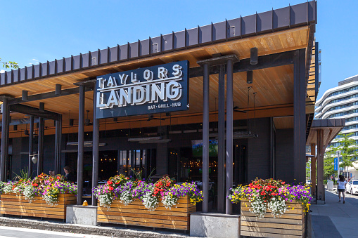 Toronto, Canada - June 15, 2018: Taylors Landing Bar Grill Hub at Shops at Don Mills in Toronto. Taylors Landing is part of the Williams Landing and Hunters Landing family.