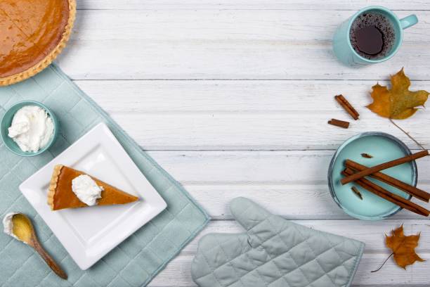 Flat lay of pumpkin pie and text space.
