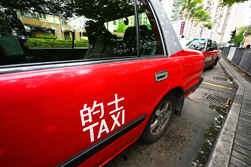 Taxi driving through the city of Johannesburg with commuters, mini buses are used as a taxi business throughout south africa.