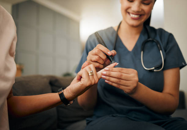 Zoom of doctor, diabetes or elderly woman hands with blood test, sugar or medical test with a glucometer. Healthcare, health nurse or diabetic lady consulting on glucose wellness in living room Zoom of doctor, diabetes or elderly woman hands with blood test, sugar or medical test with a glucometer. Healthcare, health nurse or diabetic lady consulting on glucose wellness in living room diabetes stock pictures, royalty-free photos & images