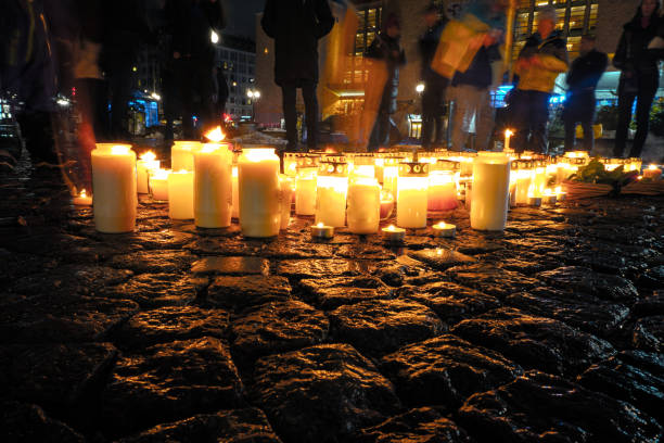 istock Candles standing on the ground during memorial day 1445322230