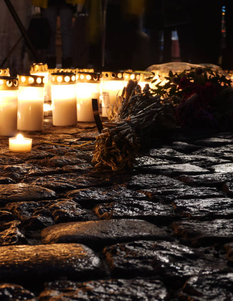 Candles standing on the ground during memorial day