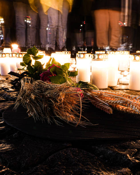 istock Candles standing on the ground during memorial day 1445322328
