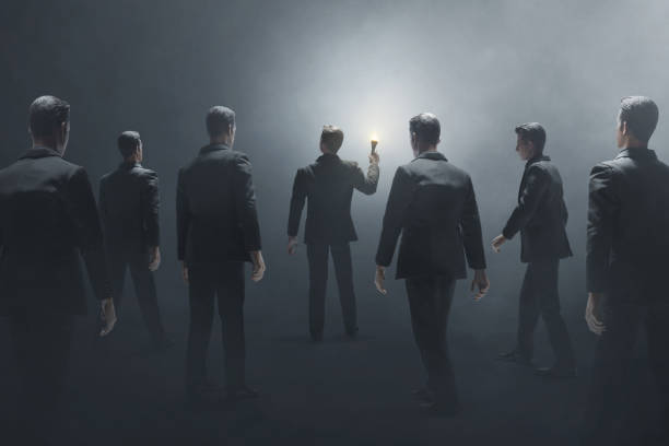 istock Business man standing holding fire torch 3d illustration 1445324250