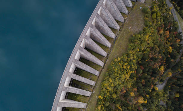 istock water dam from above, environment friendly electricity power plant 1445325522