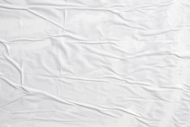 istock white crumpled and creased paper poster texture background 1445326012
