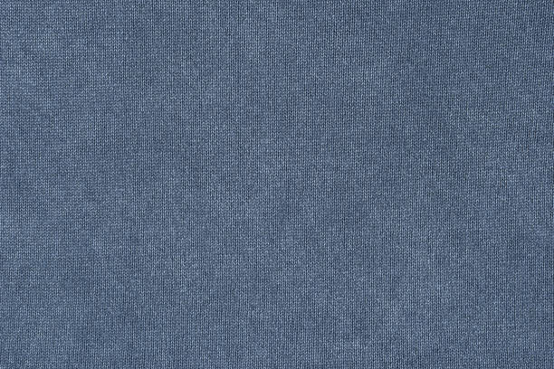 istock Gray fabric background. Grey blue Texture of knitted fabric or material 1445329409