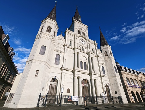New Orleans, Louisiana - November 21, 2022: The Cathedral-Basilica of St. Louis on Chartres Street opposite Jackson Square