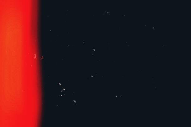 istock Film Strip Texture with Scratch and Grain Background with Red Light Leak, Suitable for Overlay and Color Cast Effect. 1445331882