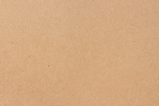 Cardboard sheet texture background, pattern of brown kraft paper with vintage style.