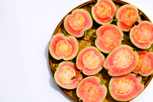 istock Fresh pink guava on white background. 1445339240