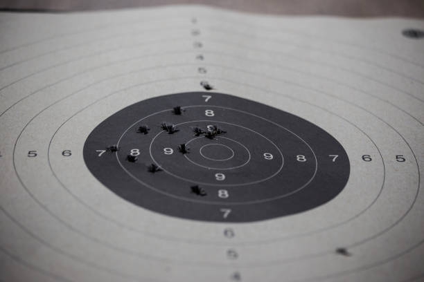 бумажная стреляющая мишень - bullet ammunition rifle gun стоковые фото и изображения