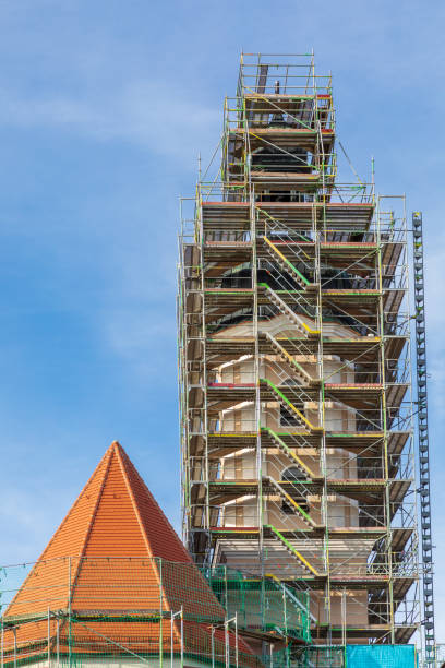 istock Scaffolding around a church tower 1445349077