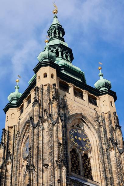 low-angle vertical shot of the st. vitus cathedral city of prague under a blue sky - st vitus katedrali stok fotoğraflar ve resimler