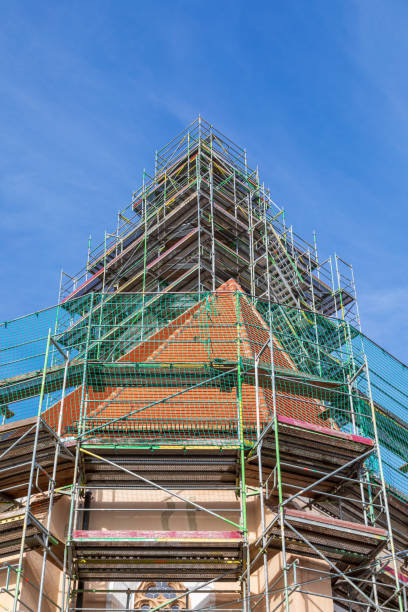 istock Scaffolding around a church tower 1445349809