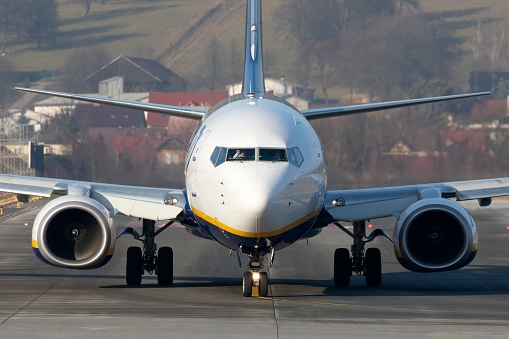 Cracow, Poland – January 03, 2020: A closeup shot of Boeing 737-800 (B738) of Ryanair arriving EPKK KRK Krakow-Balice in sunny day