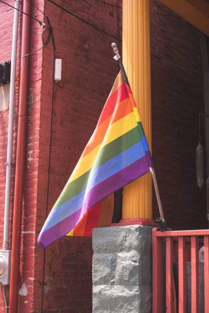 istock Rainbow flag on a balcony of a building 1445350125