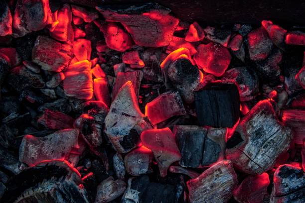 istock Of burning coal glowing in the dark 1445354560